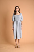 Green: Ivory Smocked Midi Dress