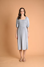 Green: Ivory Smocked Midi Dress