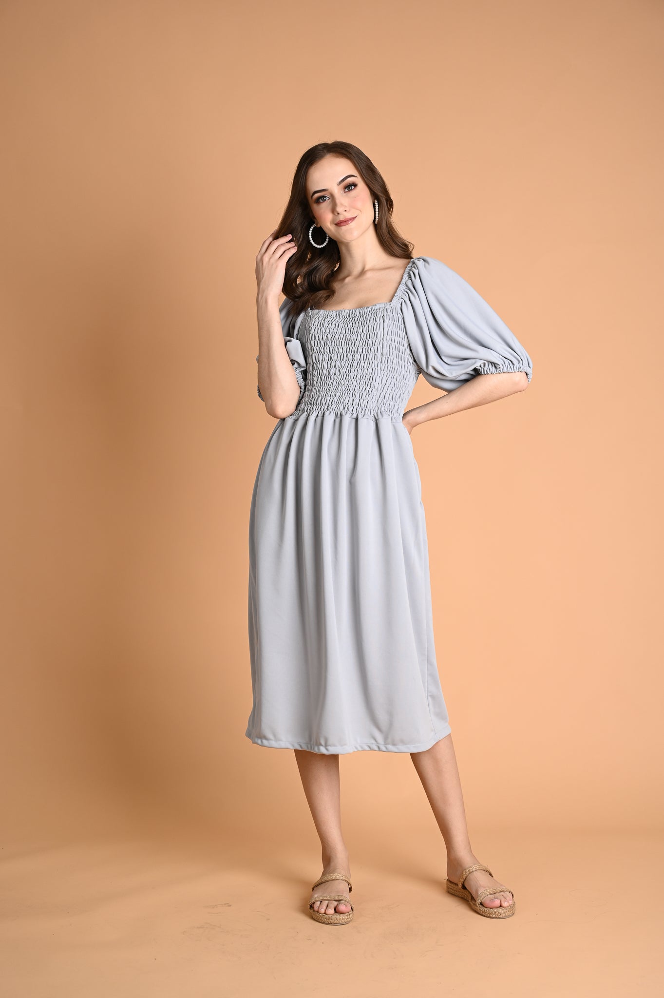 Green: Ivory Smocked Midi Dress