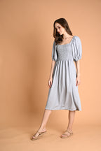 Green: Ivory Smocked Midi Dress
